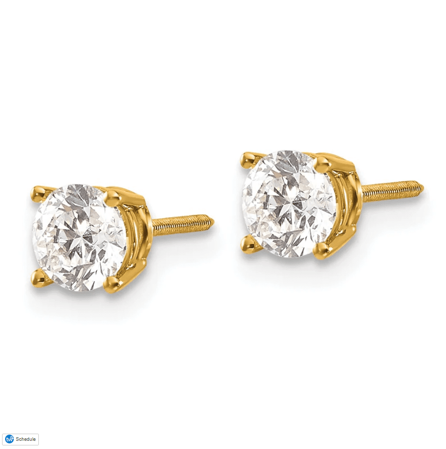 A pair of round diamond gold stud earrings set in a yellow gold four-prong setting, featuring sparkling clear diamonds. Best Diamond Gold Stud Earrings for Women