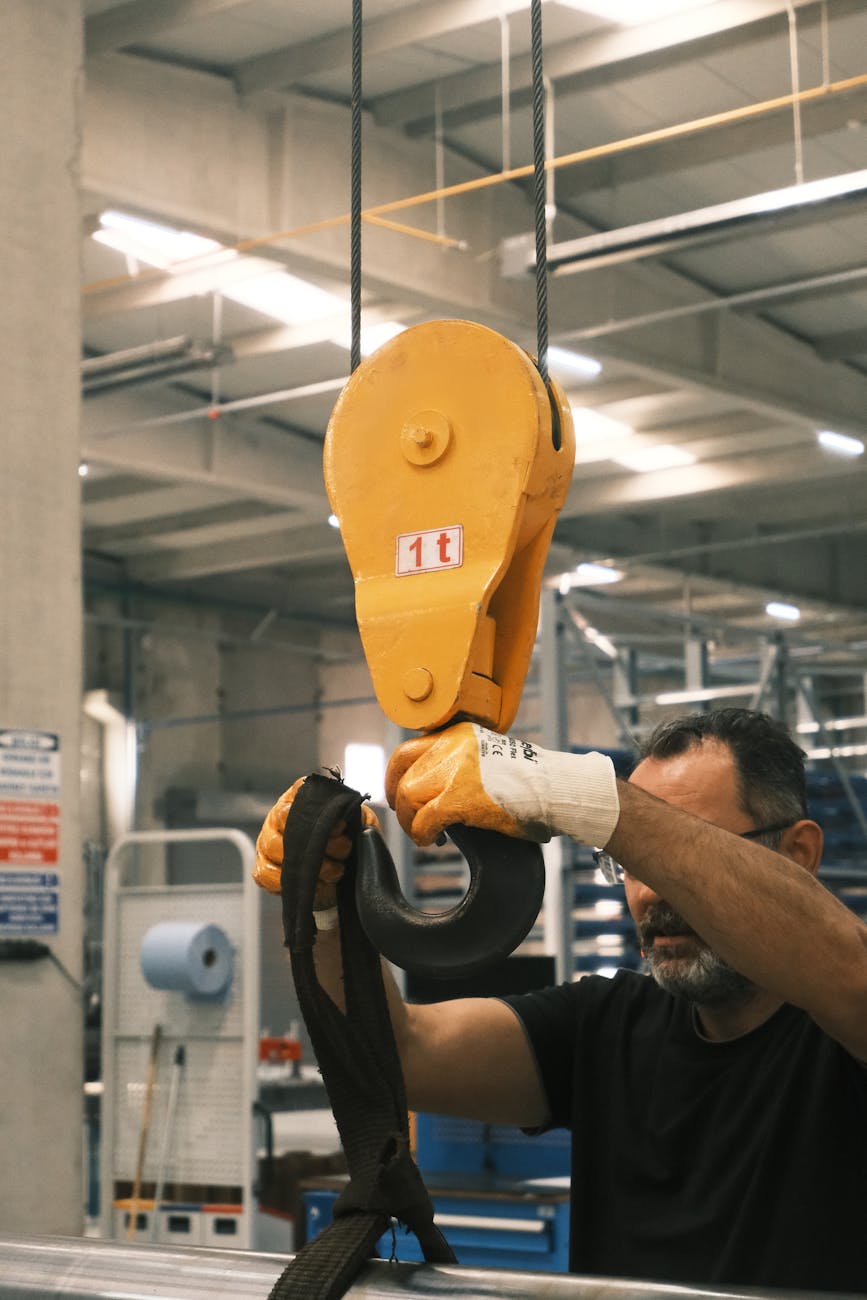 How Automation Is Transforming Heavy Metal Fabrication 10 industrial crane hook in use at factory How Automation Is Transforming Heavy Metal Fabrication