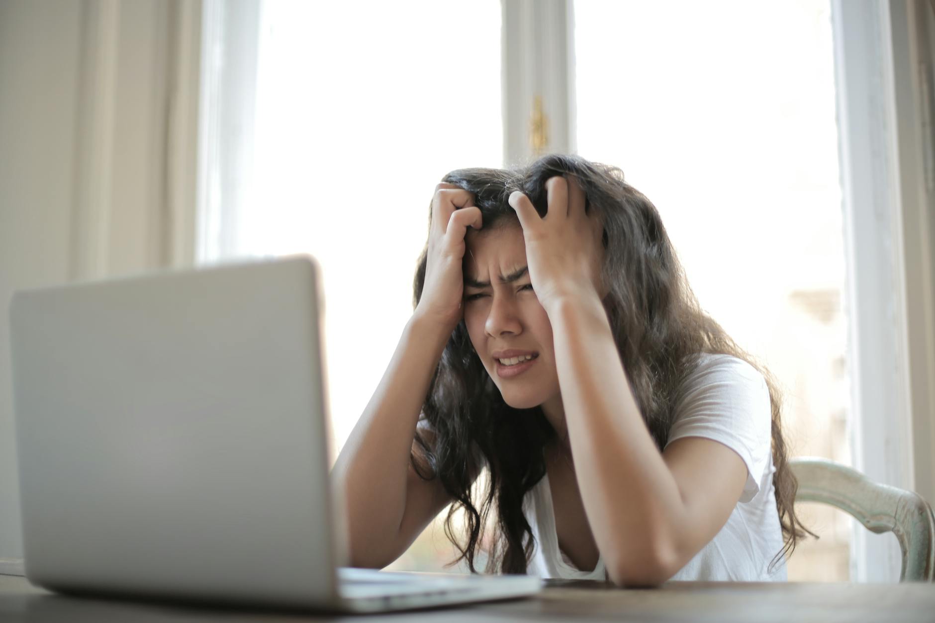 woman in white shirt showing frustration How Bad Marketing Can Hurt More Than Just Your Business
