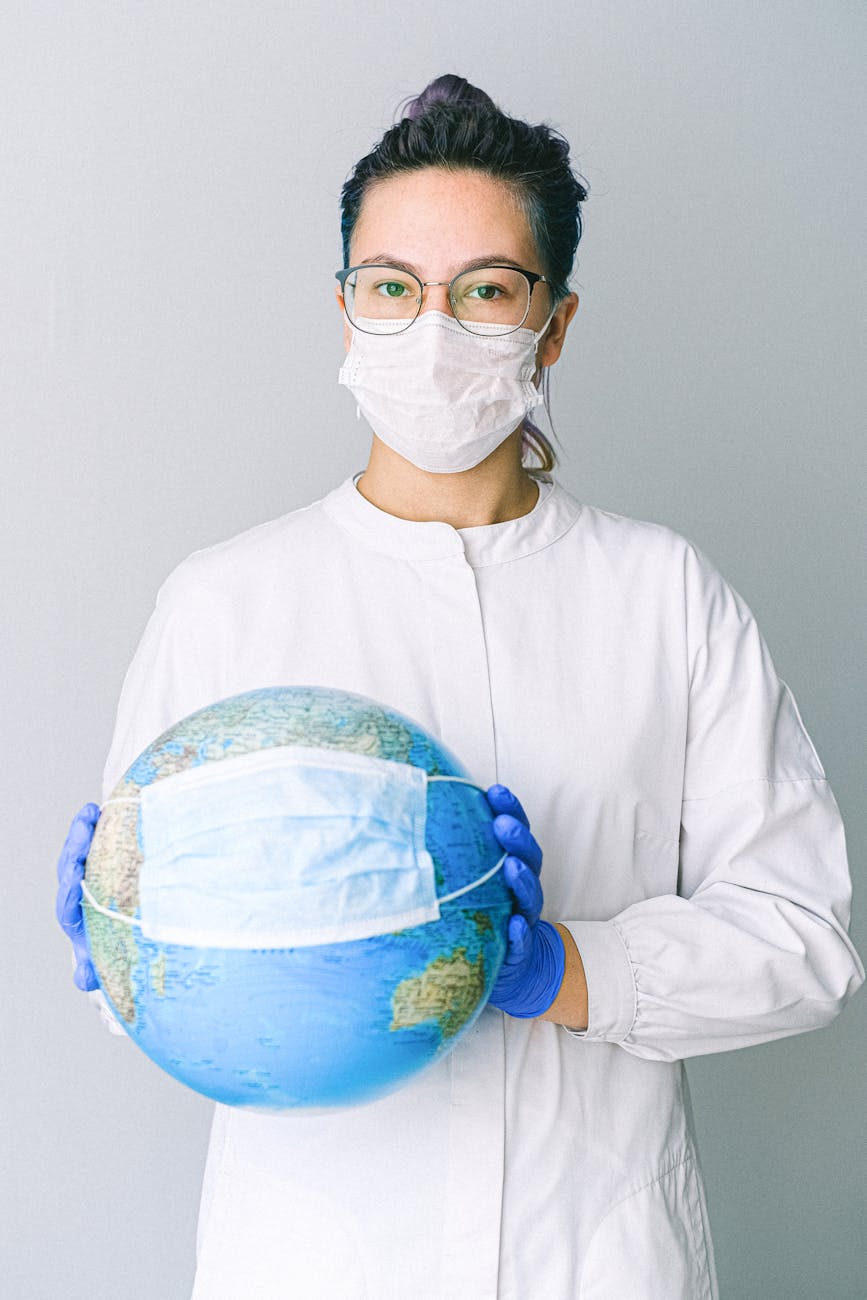 6 Careers That Let You Travel and Work At The Same Time 8 photo of person wearing protective wear while holding globe 6 Careers That Let You Travel and Work At The Same Time