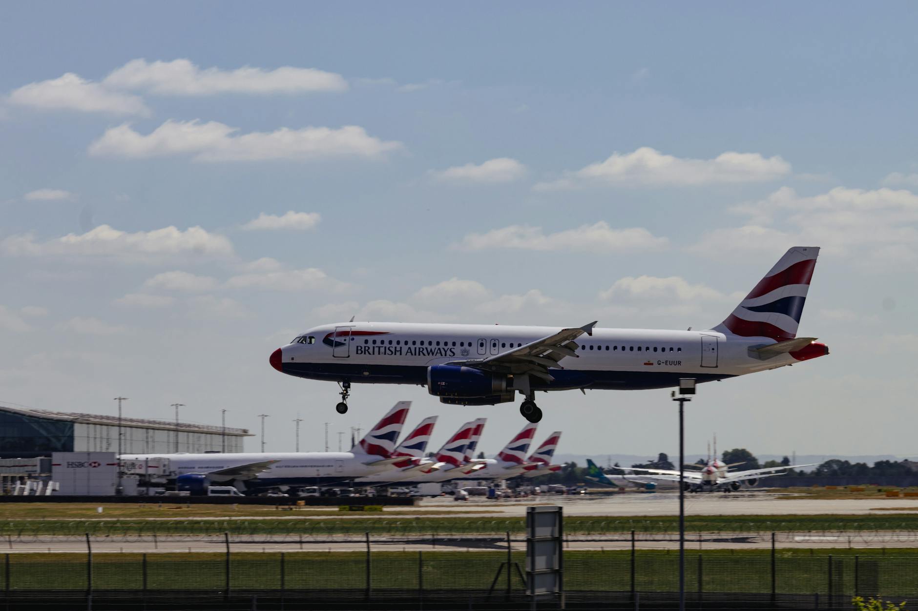 Best Airlines to Fly Business Class to the UK from the USA (2026 Guide) 9 british airways plane landing at heathrow airport Best Airlines to Fly Business Class to the UK from the USA (2026 Guide)