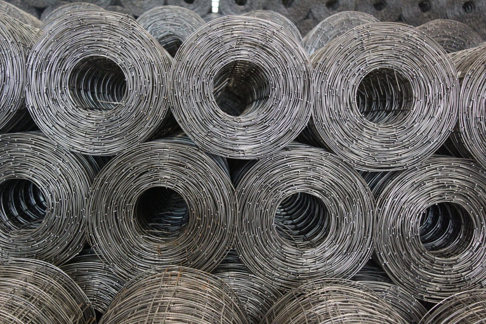 coiled steel wire mesh rolls in warehouse Cattle Fence Design: Planning Corrals, Gates, and Working Pens